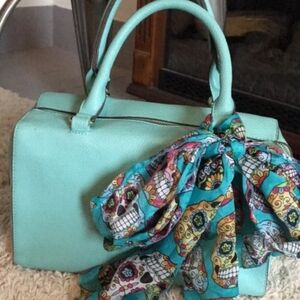 Teal faux leather purse